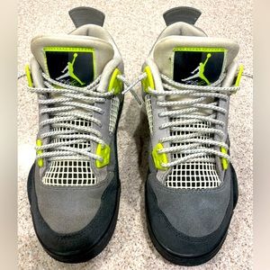 Gently used Jordan 4 Retro Neons. Youth Size 5Y. No box.